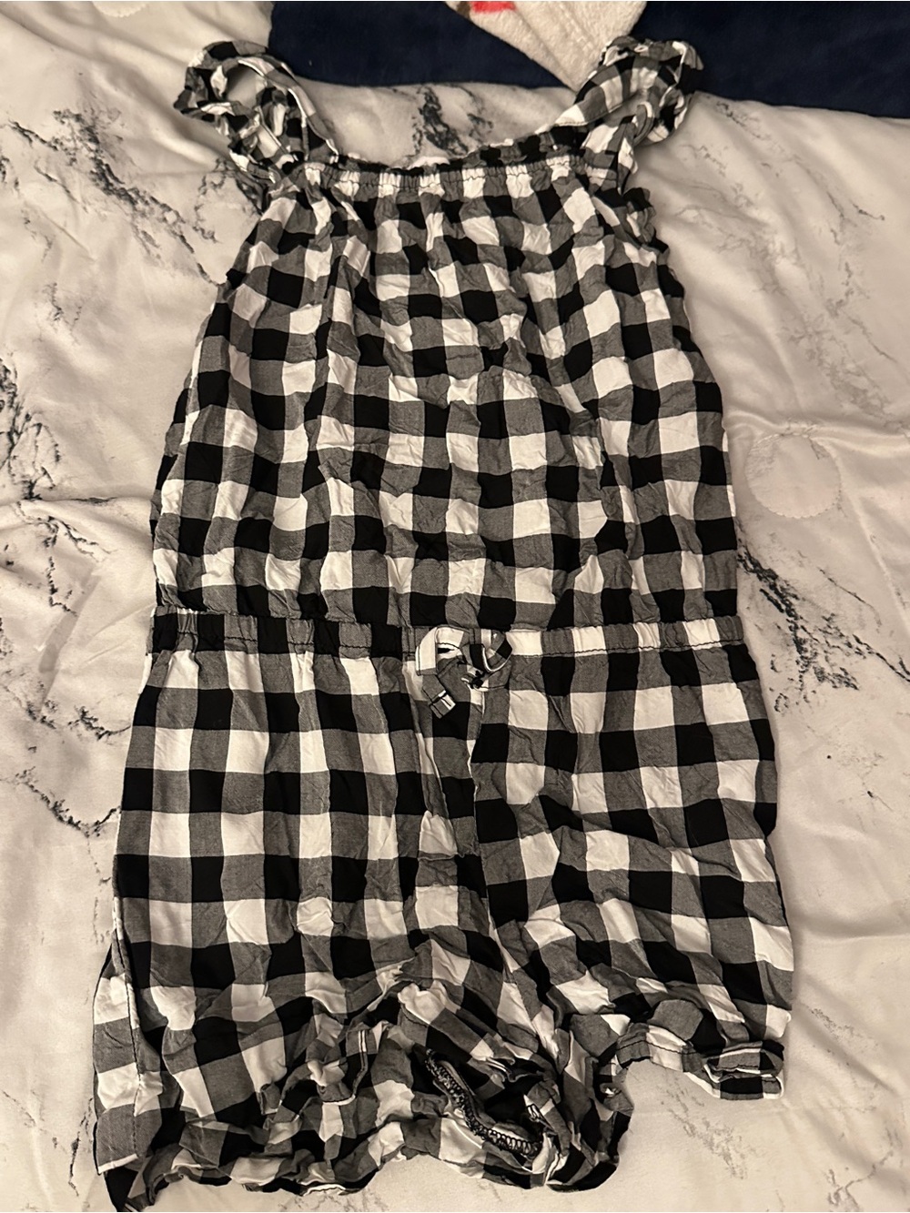 white and black the children’s place romper in a size 7/8